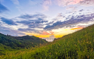 Punta Playa Cometa sunset panorama view mountains rocks Mazunte Mexico.
