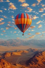 Hot Air Balloon Soaring Over Mountain Range