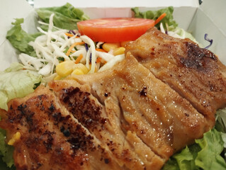 grilled chicken and vegetable salad packed