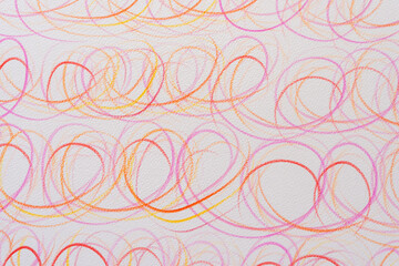 overlapping looping lines in orange and purple on textured paper