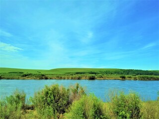 Fototapeta premium landscape with lake and blue sky