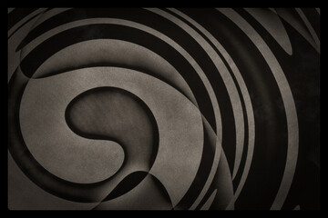 A dark curling swirling grungy abstract in sepia