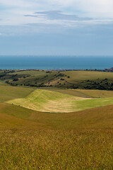 A rural Sussex landscape of the South Downs meeting the ocean - 754346337