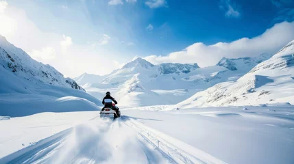 Fotobehang snowmobile in the mountains © Сергей Безрученко
