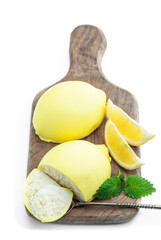 Homemade lemon cookies stuffed with whipped cream and lemon zest isolated on white background