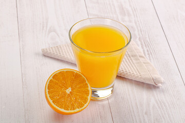 Sweet fresh orange juice in the glass
