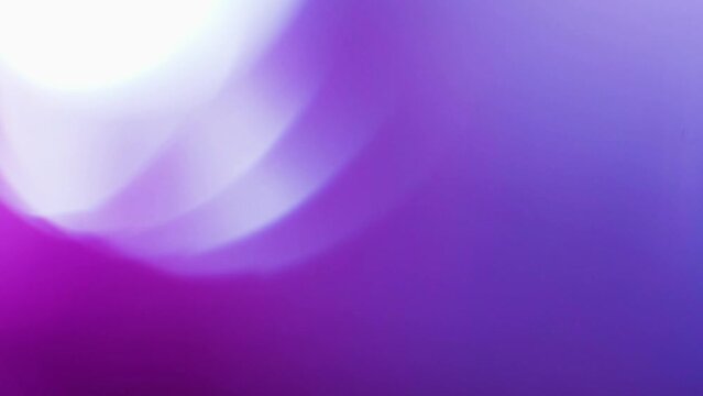 Colorful light leak, lens flare bogeh on dark background. Spectrum, rainbow colors. Motion graphic