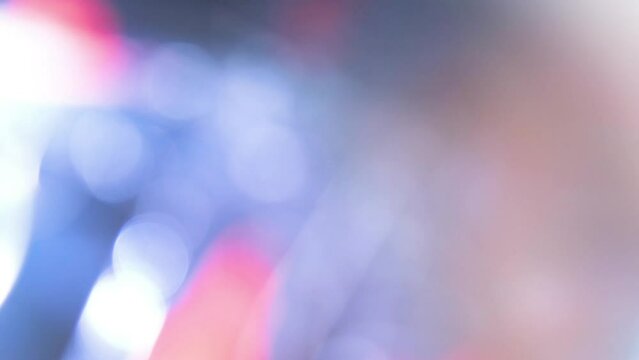 Colorful light leak, lens flare bogeh on dark background. Spectrum, rainbow colors. Motion graphic