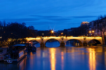 The view of bridge Ponte Marie over Seine river at night , Paris, France. It is one of the oldest bridges in Paris. - 754396946