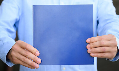 Holding a book for business or education 