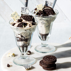 Sweet cookies and cream ice cream parfaits, ready for eating,