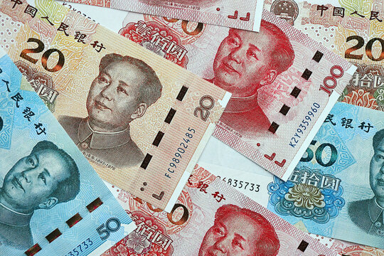 Many money bills of People Republic of China. PRC Yuan banknotes close up