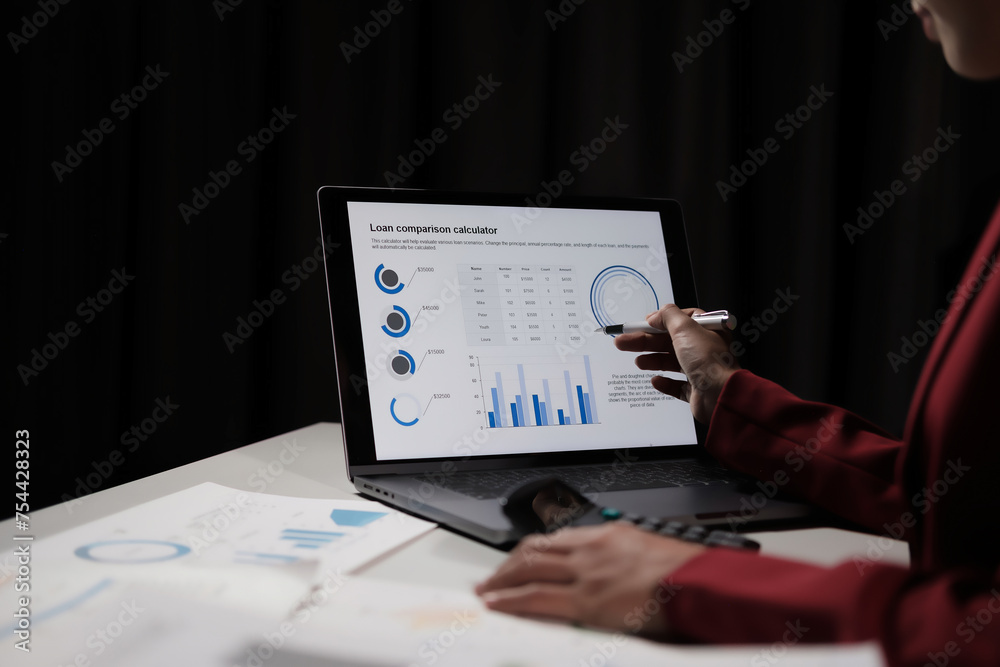 Poster a woman is using a laptop to draw a graph on a screen