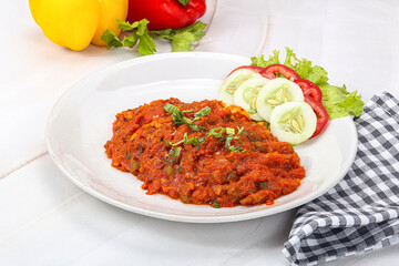Shaakshuka eggs with tomato and herbs
