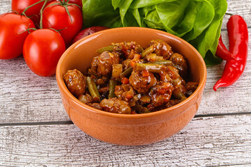 Meatball with vegetables and spices