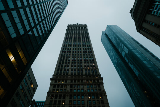 Majestic skyscrapers towering over an urban landscape on a cloudy day