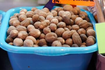 Nutmeg in container at a market