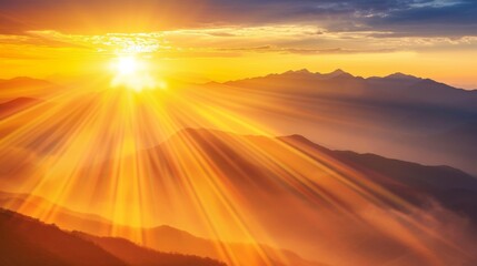 Majestic Sunrise Over Mountainous Landscape With Radiant Sunbeams
