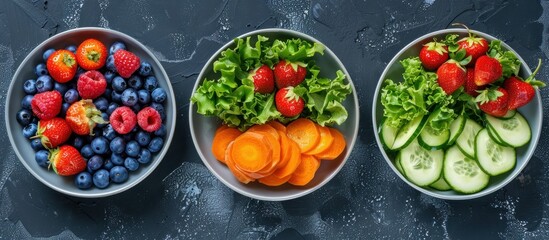 Three bowls displaying a diverse selection of fresh fruits and vegetables. - obrazy, fototapety, plakaty