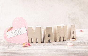 card, background for mother's day with the letters: mum for mother's day. - 754449710