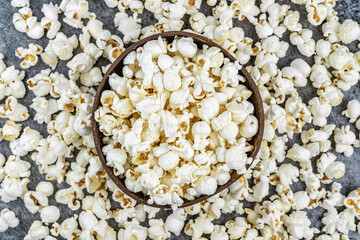 Fresh popcorn snacks in a wooden bowl