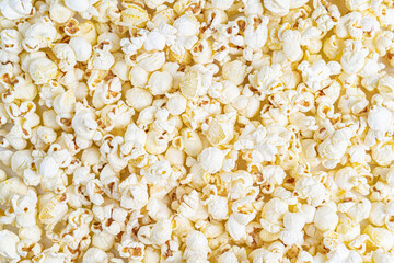 Fresh salted natural popcorn texture background. Close up detail
