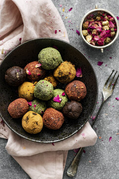 Healthy chickpea truffles with dried fruit on a table