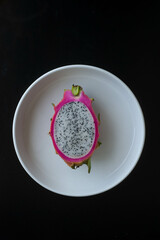 Dragon fruit on a white plate