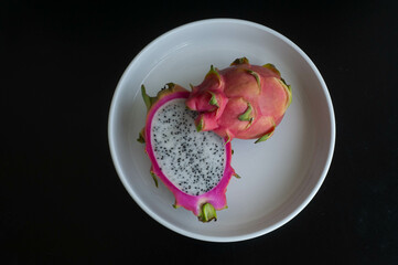 Dragon fruit on a white plate