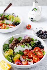 Greek meatballs with tzatziki sauce.