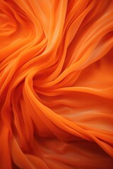 Obraz premium Detailed close up of vibrant orange fabric, ideal for fashion or textile backgrounds