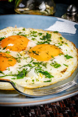 Fried eggs with a slice of bread