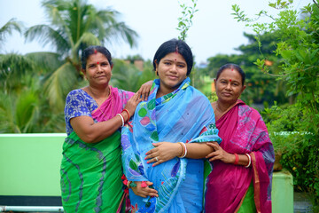 Portrait of south asian women in traditional costumes 