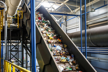 moving conveyor transporter on Modern waste recycling processing plant. Separate and sorting...