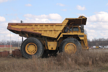 A large, high capacity, Earth moving dump truck sets on a construction site at a local shopping center in Triadelphia, WV on February 27, 2024.