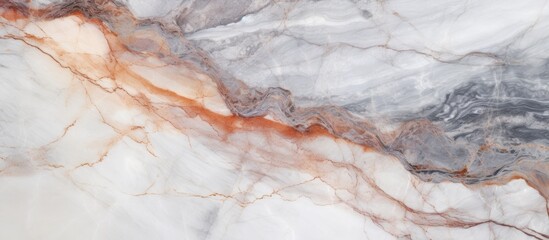 Obraz premium A high-resolution close-up of a textured marble surface, showcasing intricate patterns and details. The surface is smooth and glossy, with veins and swirls adding depth and character.