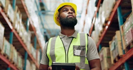 Walking, warehouse and black man with tablet for inspection, inventory and online stock. Shipping, distribution and person on digital tech for logistics, maintenance and manufacturing in factory - Powered by Adobe
