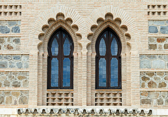Ornate windows in moorish style in Toledo railway station - obrazy, fototapety, plakaty