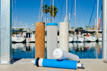 A set of used cartridges for water purification. Filters and membranes for the reverse osmosis system on the yacht