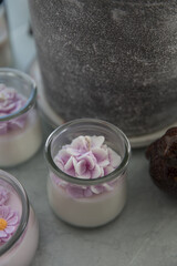 Candles in the form of colorful flowers