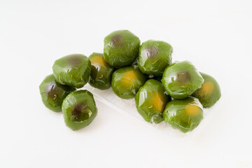 Multiple moxa balls on white background