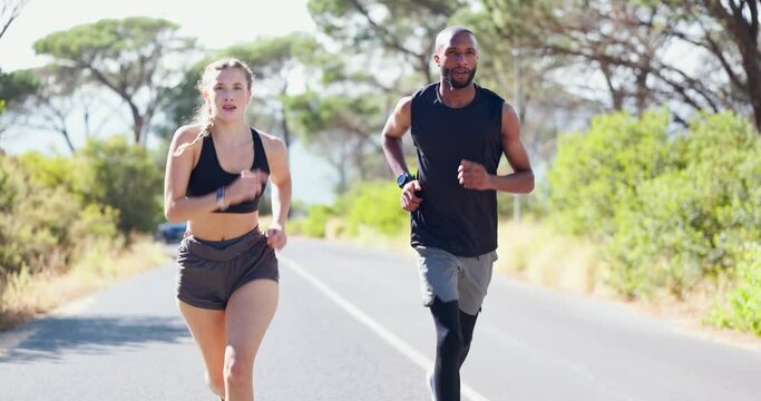 Friends, running and training by cardio on street, active and performance for fitness outdoors. People, road and workout challenge for health, support and together for exercise or sports in nature