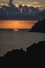 Fototapeta na wymiar Sunset seen from Ionian Sea coast on near Sinarades village on Corfu Island, Greece