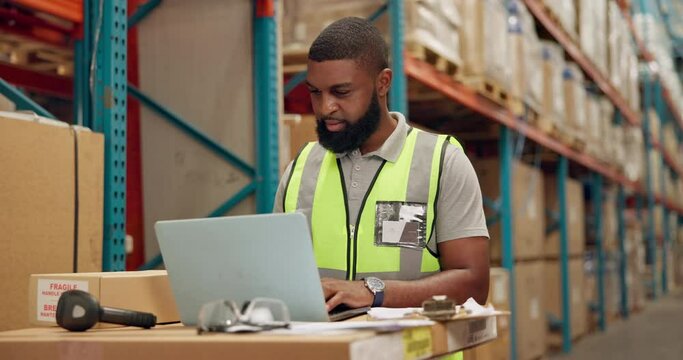 Man, laptop and checklist for inventory in warehouse, technology and research for logistics solutions. African worker, computer and stock taking for ecommerce and online order in distribution center