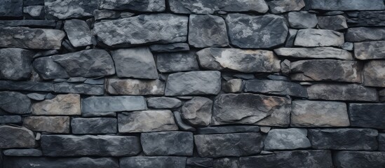 Rugged Stone Wall Texture on Dramatic Black Background - Industrial Urban Design Element