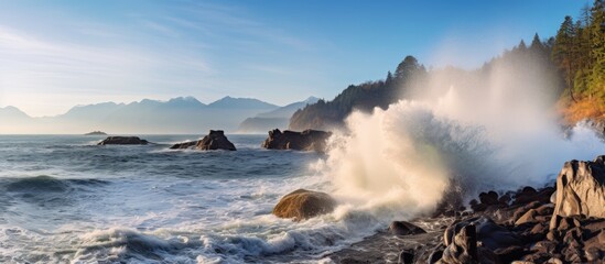 Obraz premium Majestic Power of Nature: Stunning Image of a Massive Ocean Wave Crashing on Rocky Shoreline