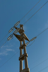 electricity towers near a wind farm