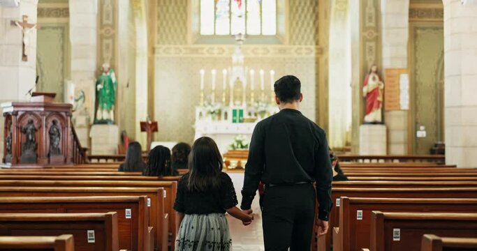 Family, church and catholic for funeral, walking isle and sunday service for condolences and death. Father, daughter and benches at cathedral, synagogue and back view for chapel and sad farewell