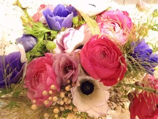 bouquet of colorful flowers, a floral composition arranged in a creative way.