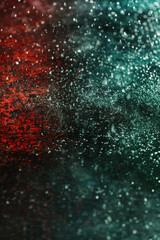Abstract bokeh background, red and green colours on dark background. Suitable for Christmas and New Year themes